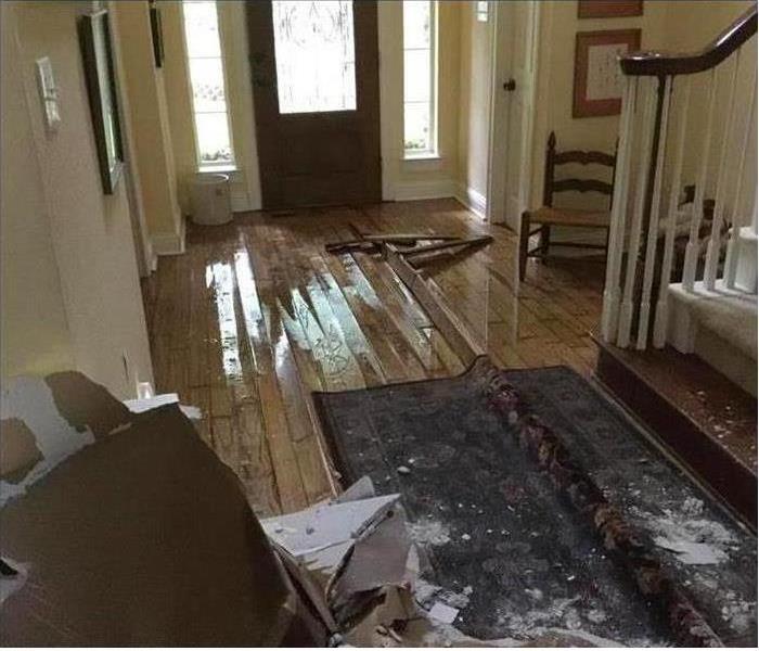 Wooden floor damaged due to storm